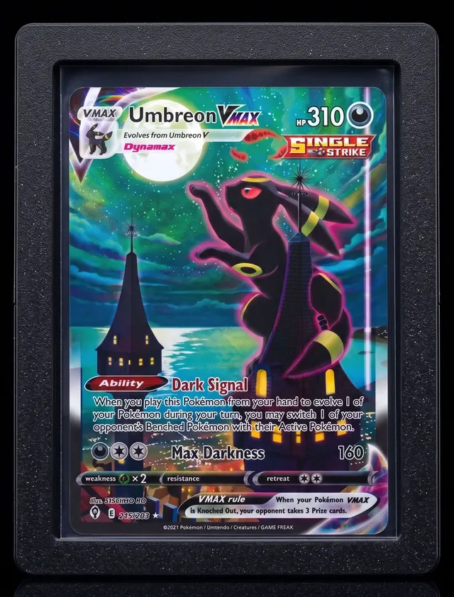 Alpha Loader in Onyx holding Umbreon VMAX